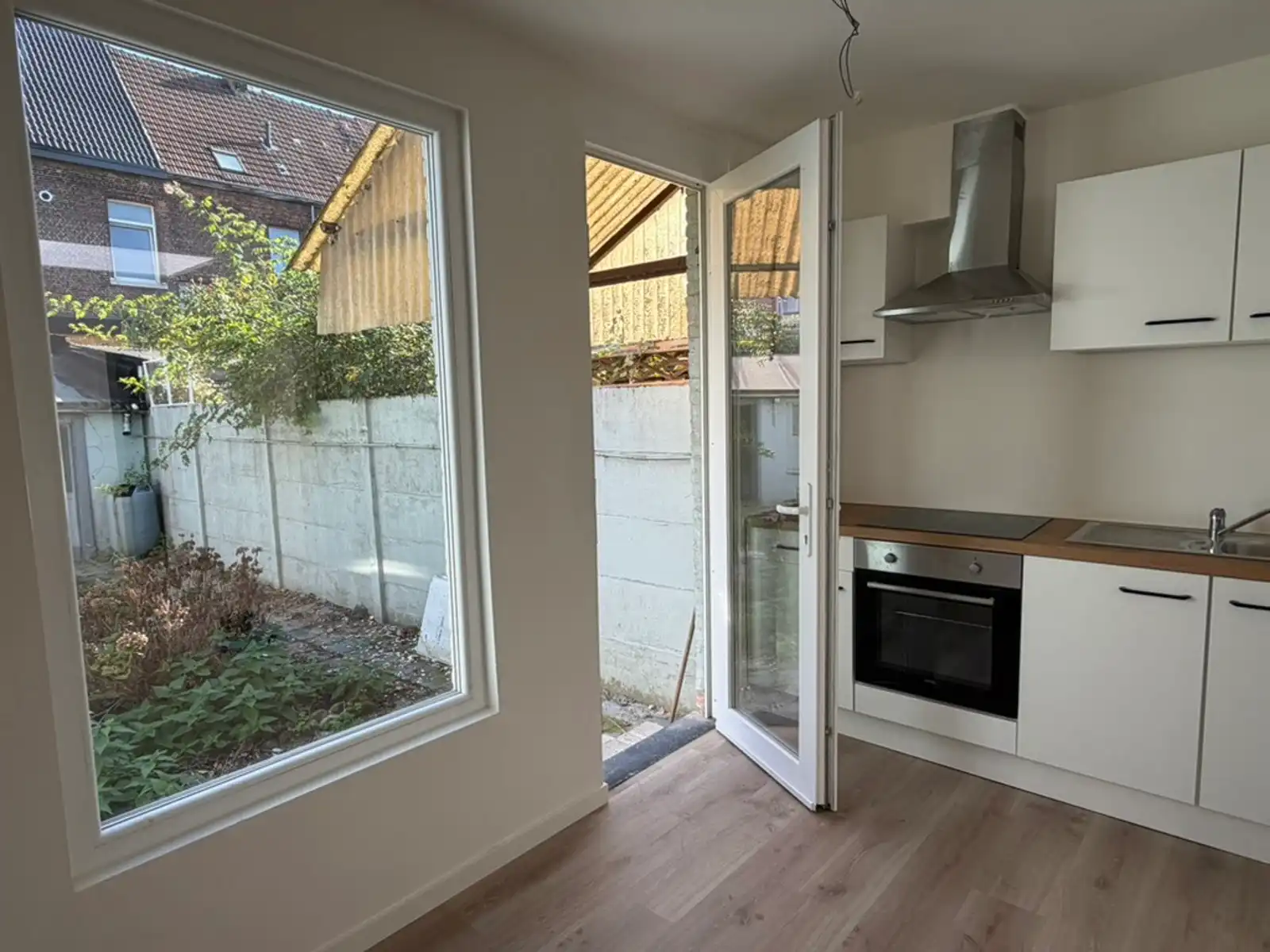 Een frisse start in een huis met karakter, tuin én garage! foto 6