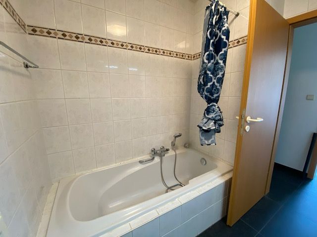 Gelijkvloers 2 slaapkamer appartement met garage in centrum van Geel foto 13