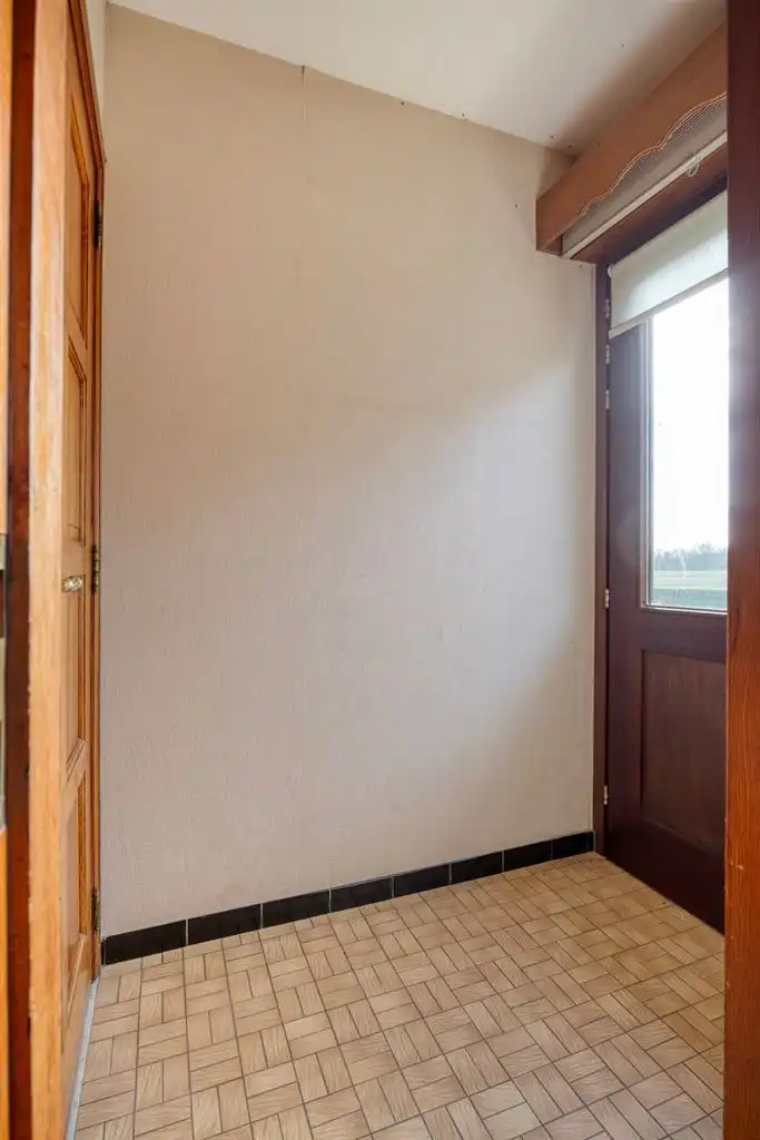 Vrijstaande woning op een uitzonderlijk perceel van 29a95ca met 4 slaapkamers en inpandige garage, gelegen op een rustige toplocatie nabij het centrum van Maaseik. foto 21