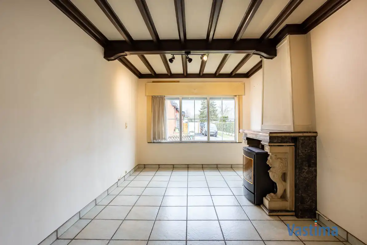 Te renoveren, halfopen woning met zuid gerichte tuin foto 3