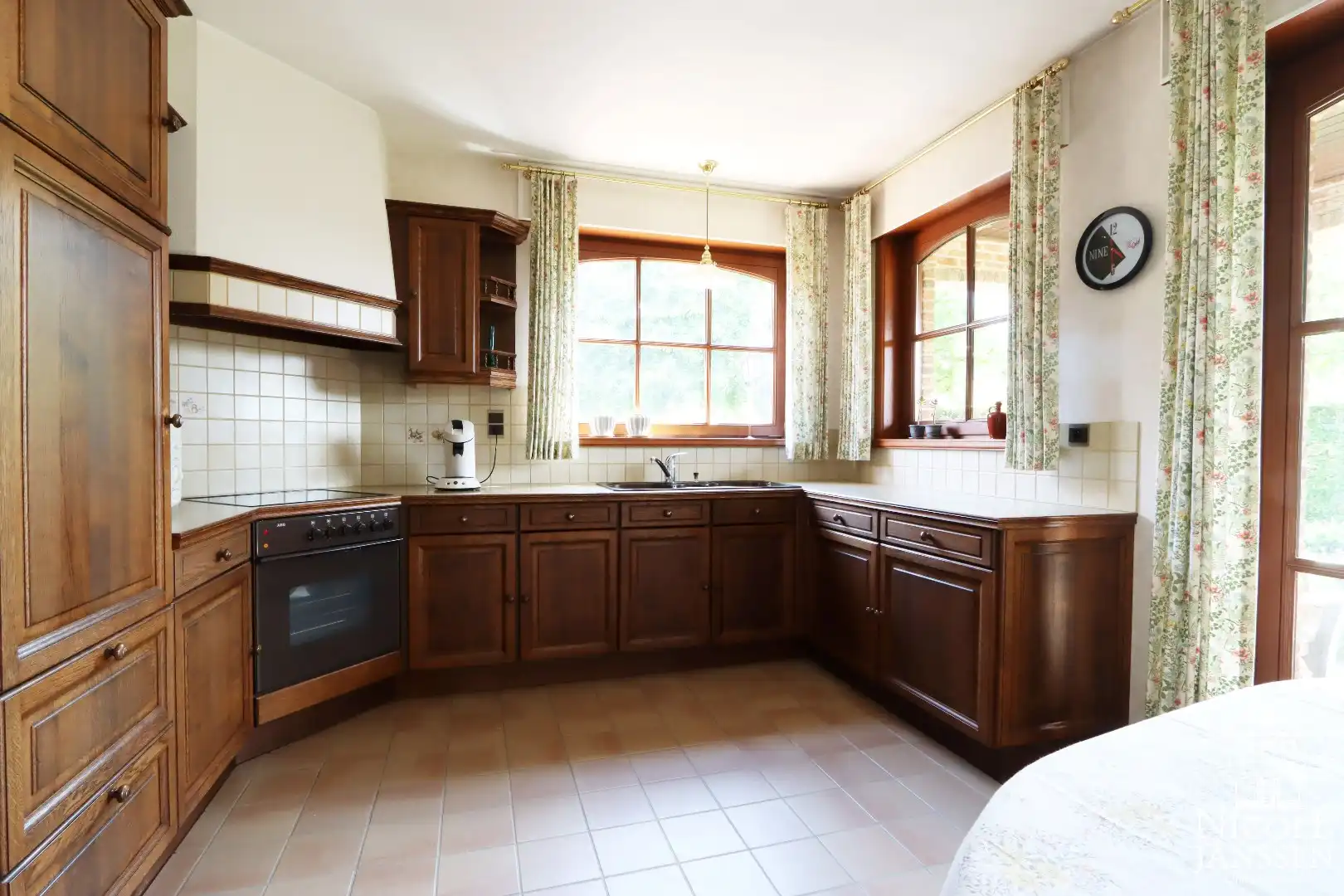 Instapklare en ruime gezinswoning met garage en diepe tuin in het gezellige Beek foto 10