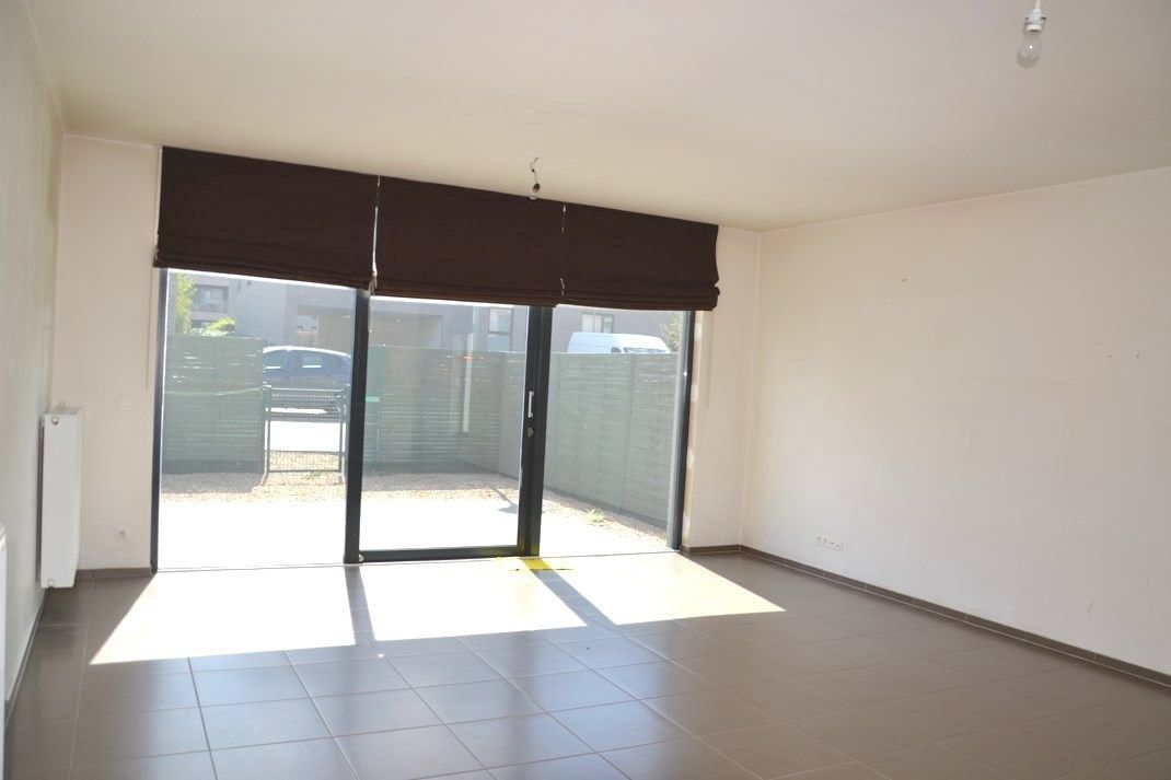 Ruime woning met 4 slaapkamers en autostaanplaats! foto 2