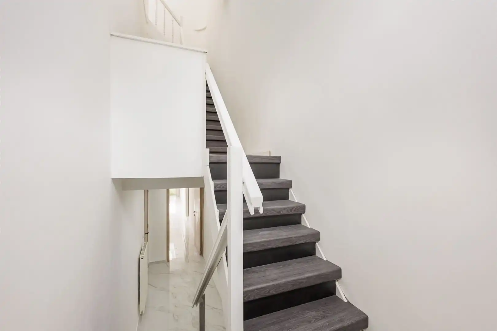 Volledig gerenoveerd & Energiezuinig: Ruime gezinswoning met 3 slaapkamers foto 10