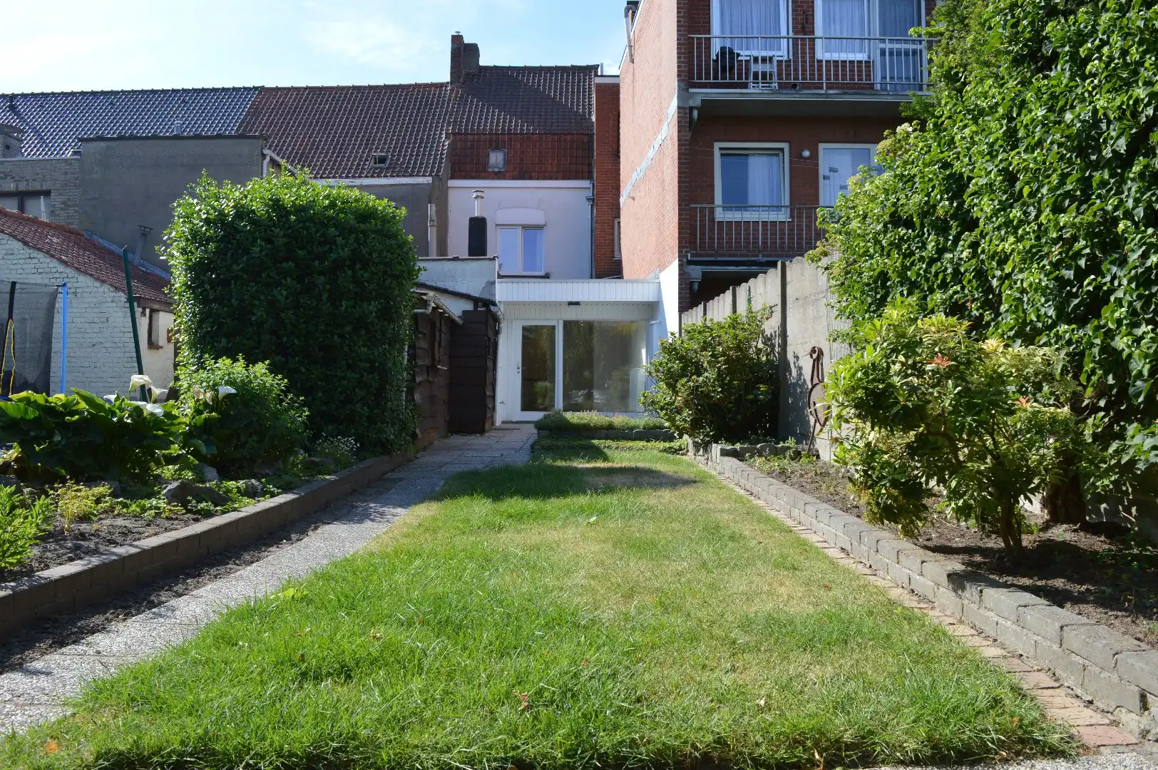 Gezellige woning met 2 slaapkamers en mooi stukje tuin te koop te Heule foto 12