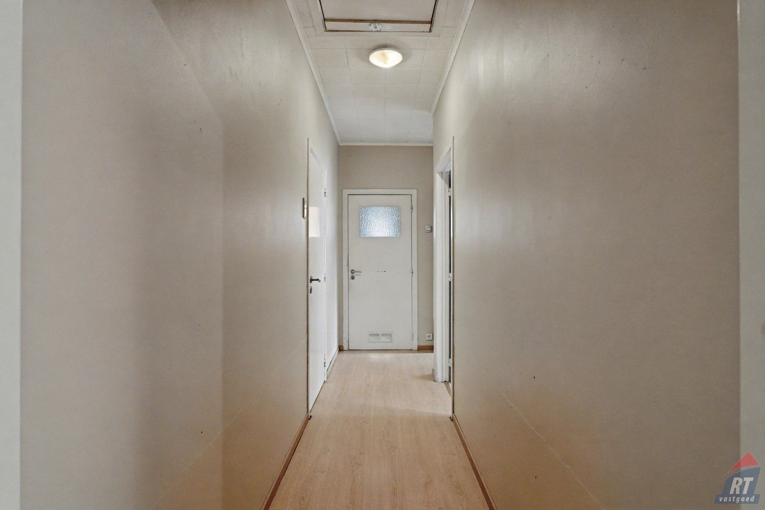 Gelijkvloerse halfopen woning met tuin en renovatiepotentieel in het hart van Sint-Truiden foto 8