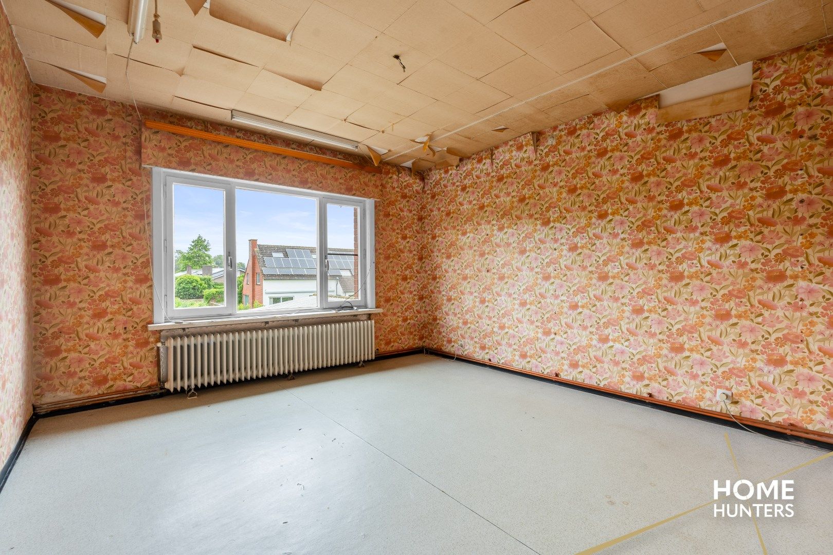 Te renoveren halfopen woning met 4 slaapkamers, 2 garages en veel potentieel te Ieper foto 17