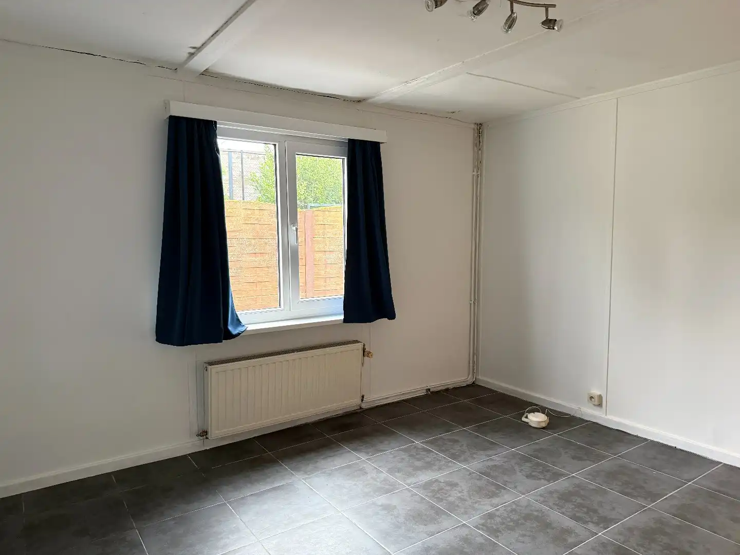 Laagbouwwoning met 2 slpk, carport en tuin foto 8