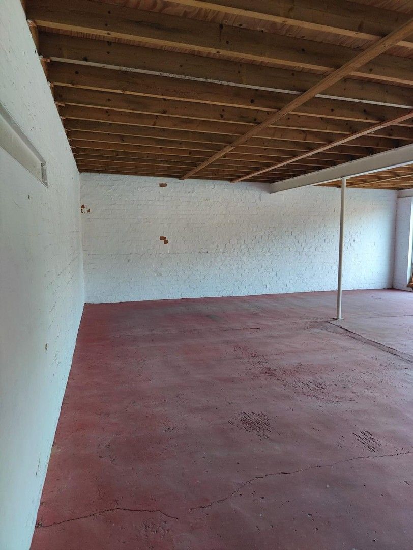 Woning met loods en voormalige showroom foto 5