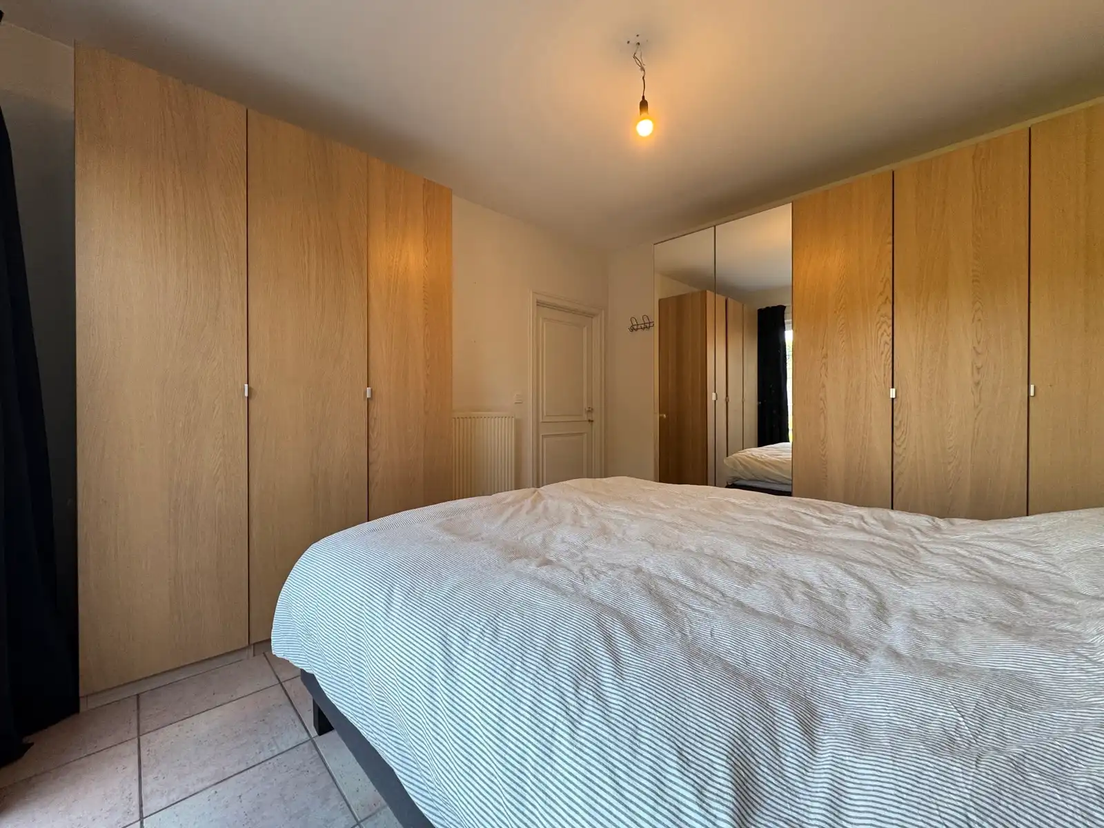 Gelijkvloers appartement met ruime privé tuin en garage foto 5