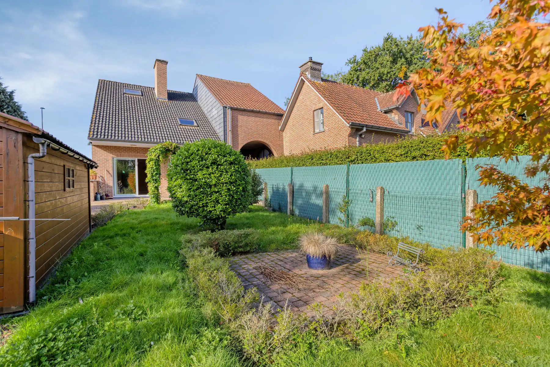 Half open bebouwing met 3 slaapkamers, garage en ruime tuin! foto 23
