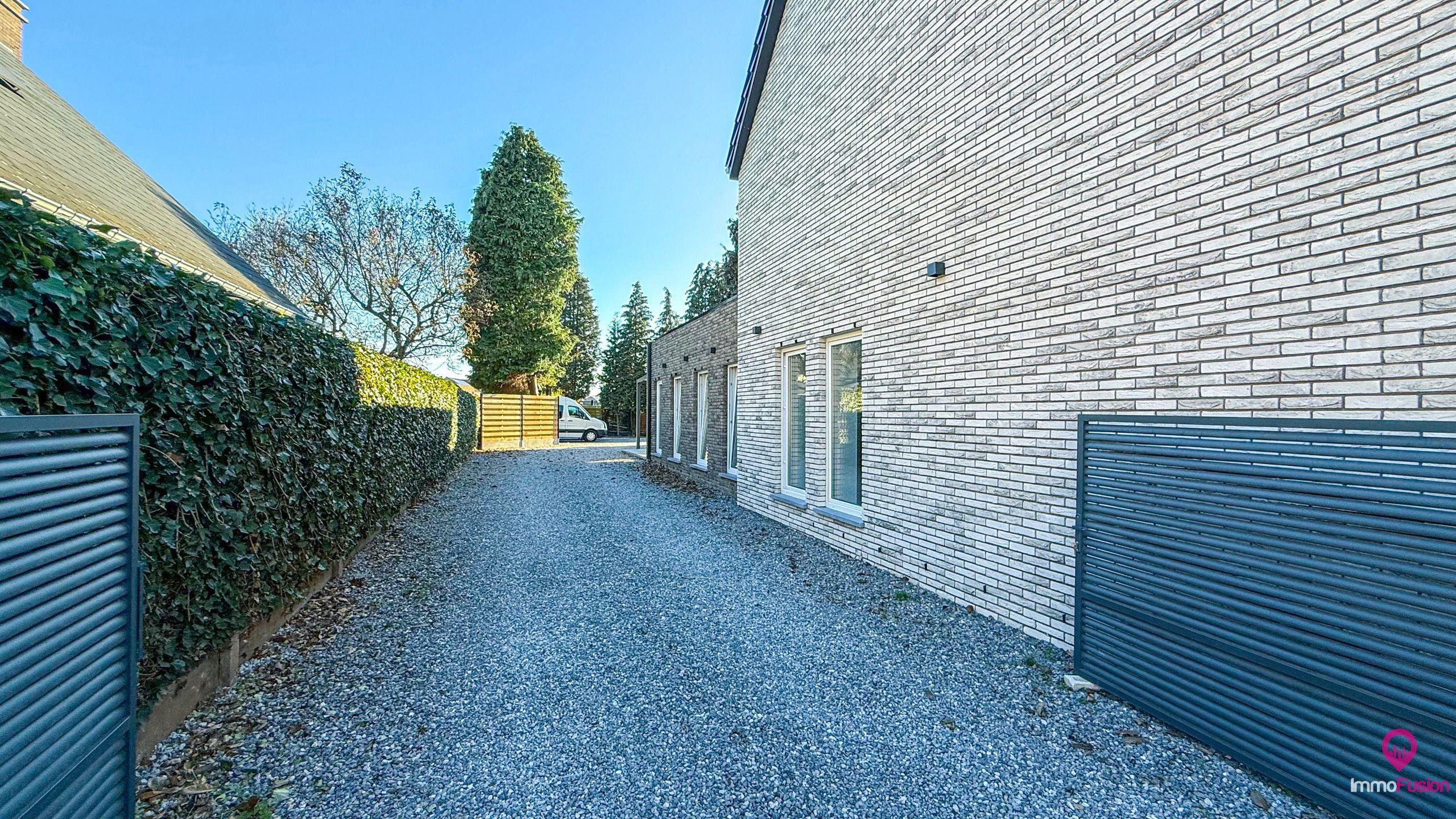 Instapklare woning met 5 slpks op riant perceel te Paal! foto 35