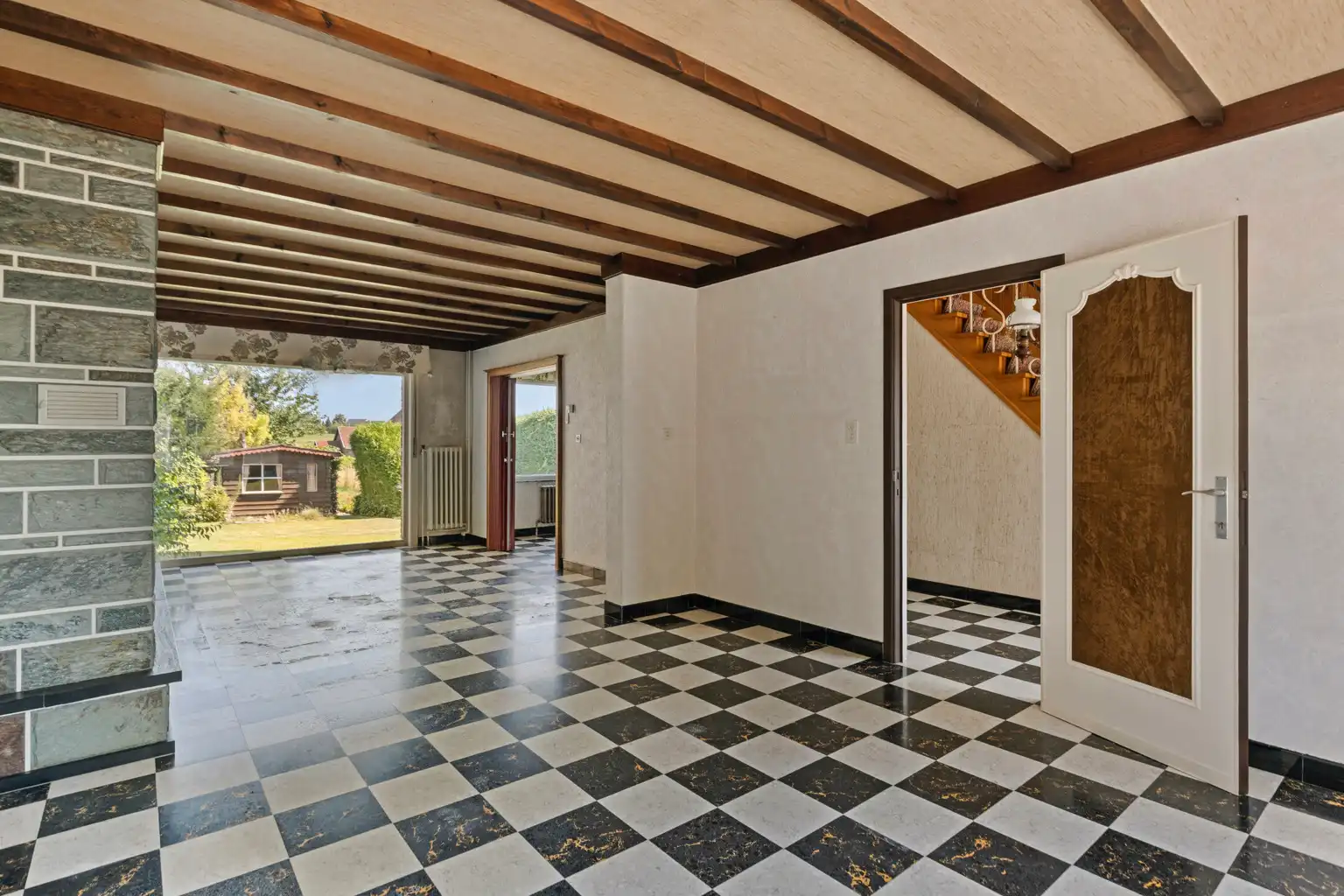 WONING MET TUIN IN DOODLOPENDE STRAAT foto 4