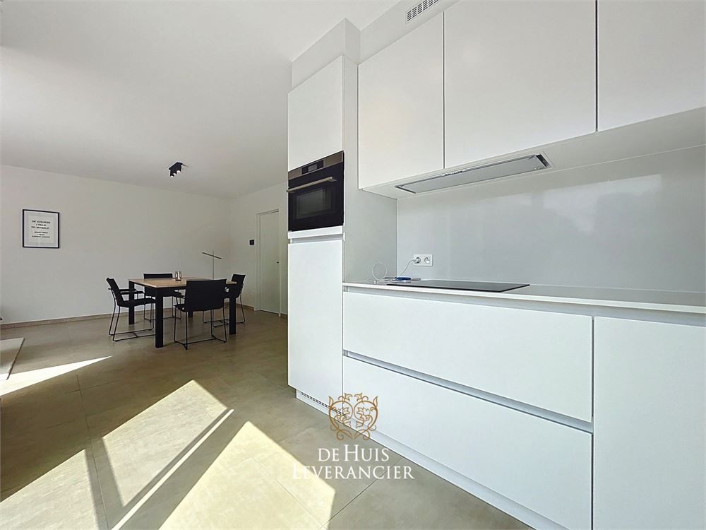 Discrete luxe & tijdloze elegantie : subliem nieuwbouwappartement met terras en gemeenschappelijk tuin te koop in Boechout foto 25