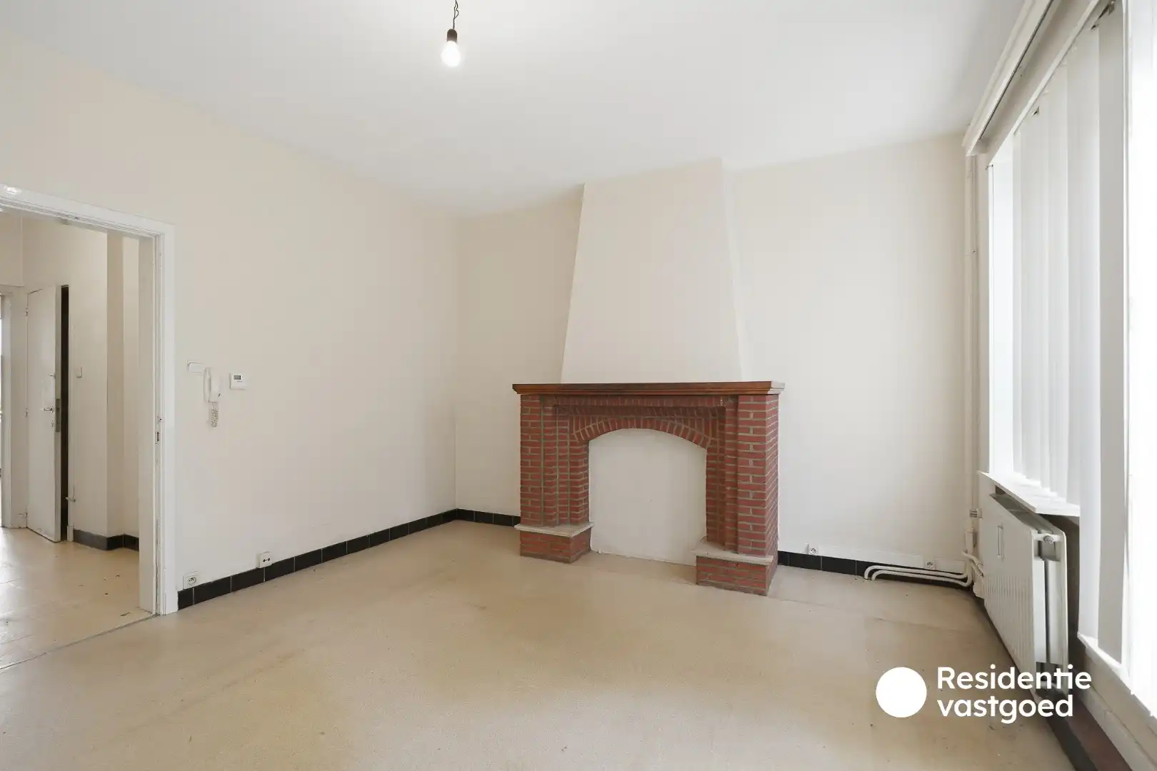 Interessante investeringseigendom met 2 vergunde appartementen, garage en ruime tuin! foto 4
