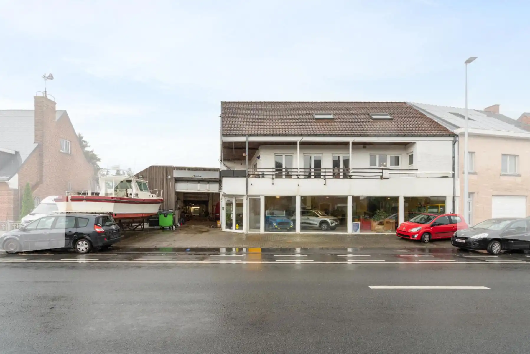 Duplex appartement met handelszaak en werkplaats foto {{pictureIndex}}