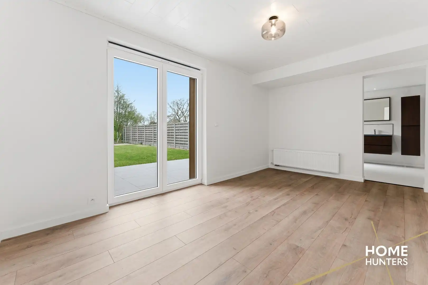 Prachtig gerenoveerde woning te Brielen met 2 slaapkamers, 2 badkamers en een garage foto 6