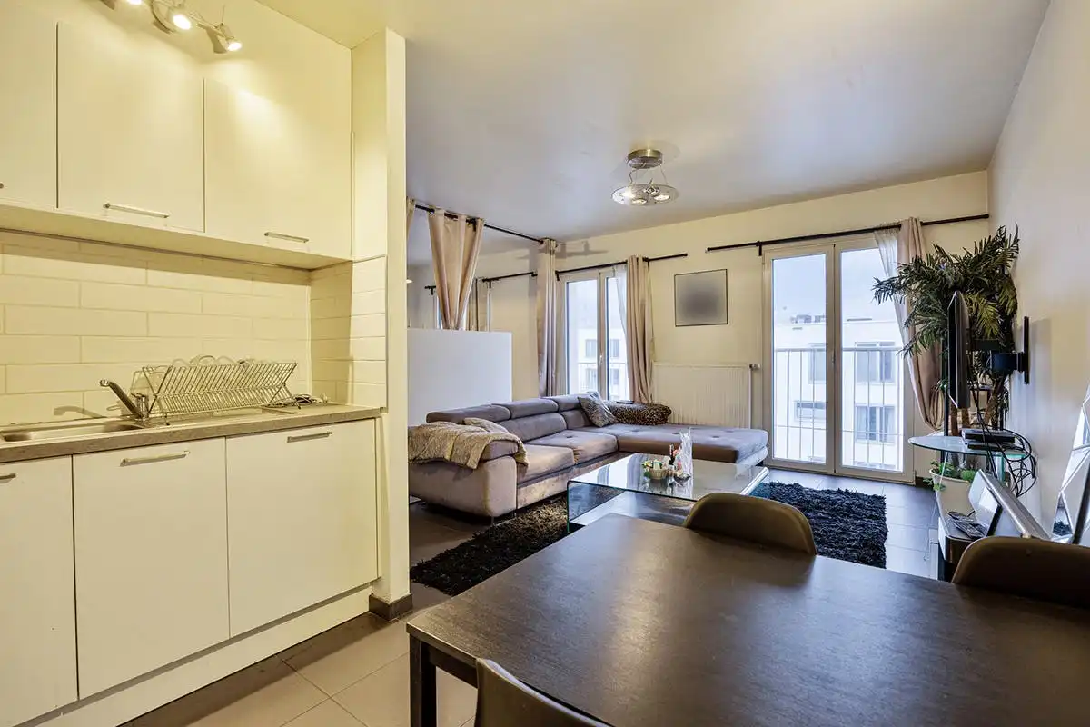 Penthouse Studio met zicht op Tour & Taxis te koop foto 2