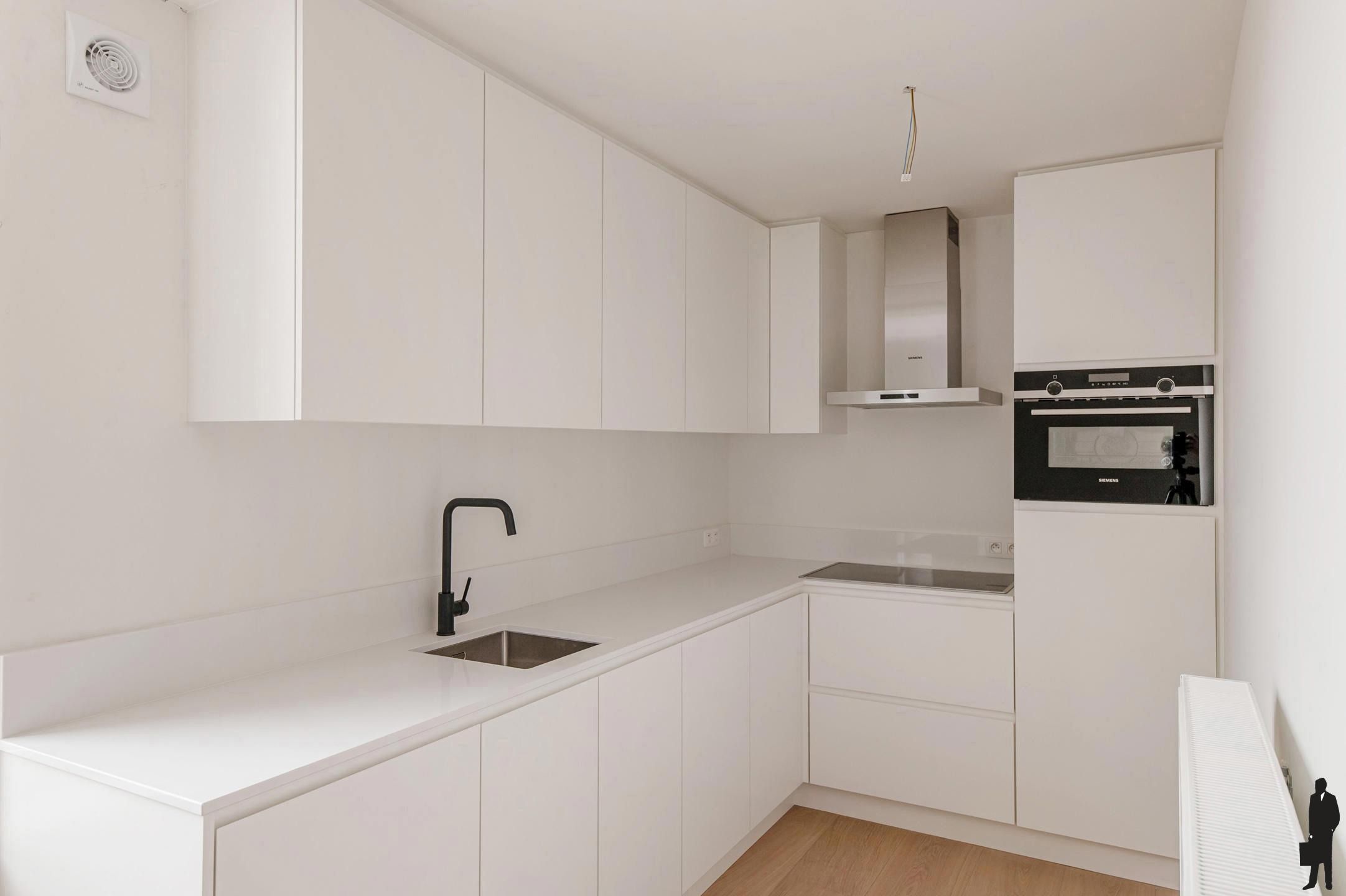 Charmante gerenoveerde duplex met 2 slaapkamers foto 4