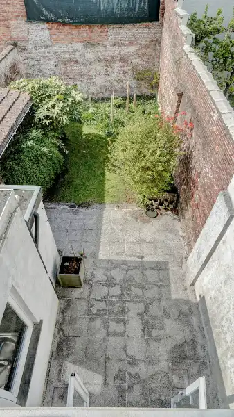 Ruime herenwoning met mogelijkheid handelsgelijkvloers/praktijkruimte/kantoren met woonst op 1 are 79 ca met stadstuintje foto 16