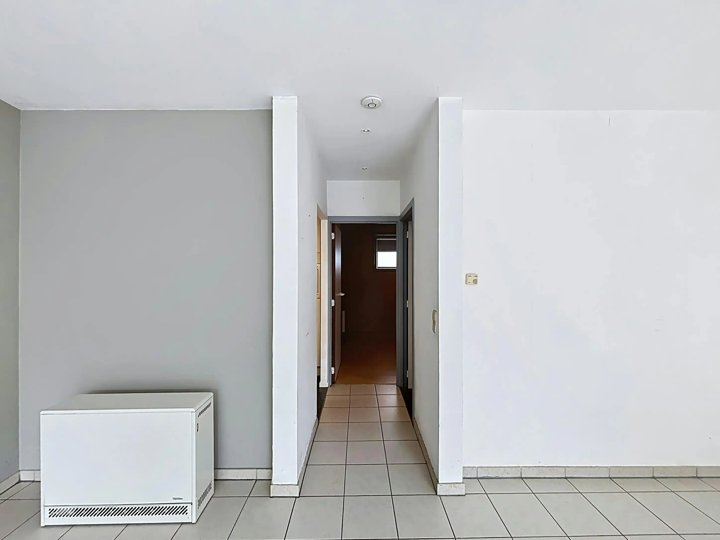 Instapklaar gelijkvloers appartement met gemeenschappelijke tuin en fietsenberging in hartje Kapellen! foto 6