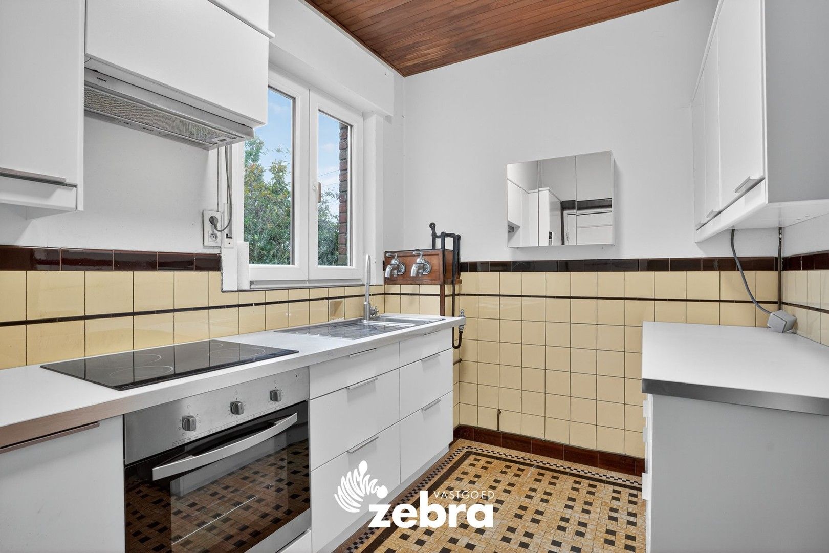 Charmante alleenstaande woning met ruime tuin in Beveren-aan-de-IJzer! foto 11