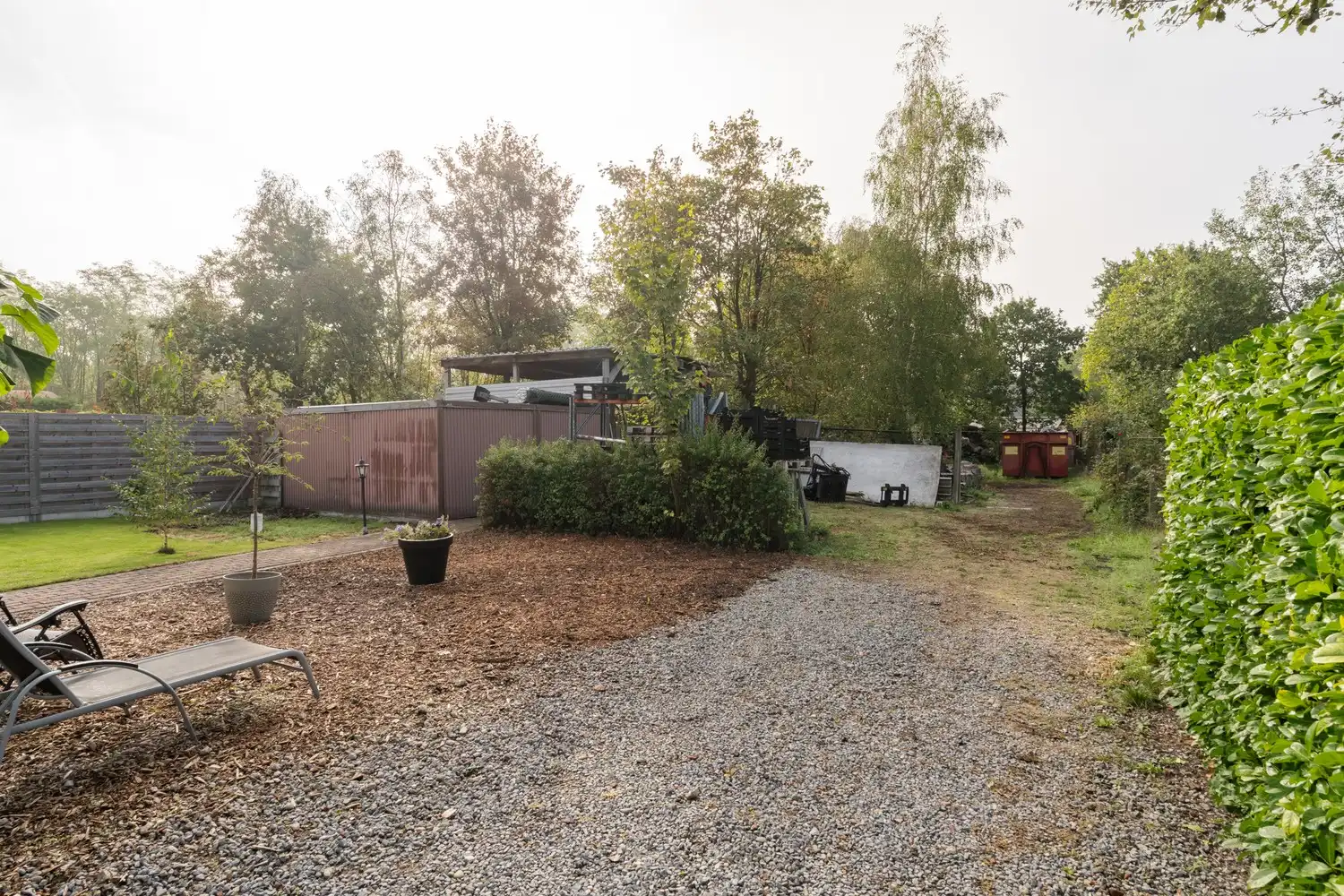 Veelzijdige woning met zorgmogelijkheden, werkruimte en tal van bijgebouwen foto 40