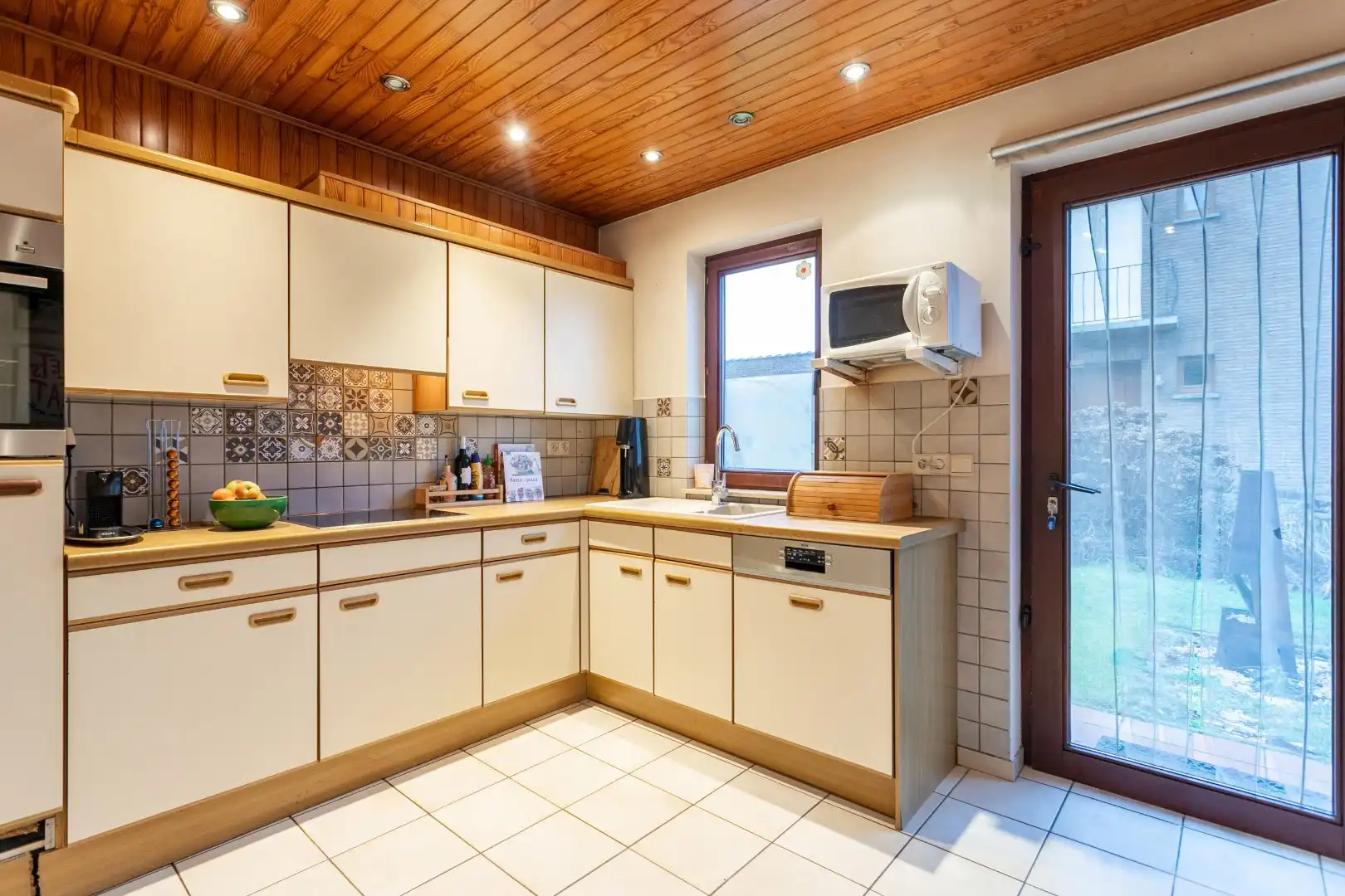 Op te frissen bungalow met 2 slaapkamers, garage en tuin op topligging in Halle foto 7