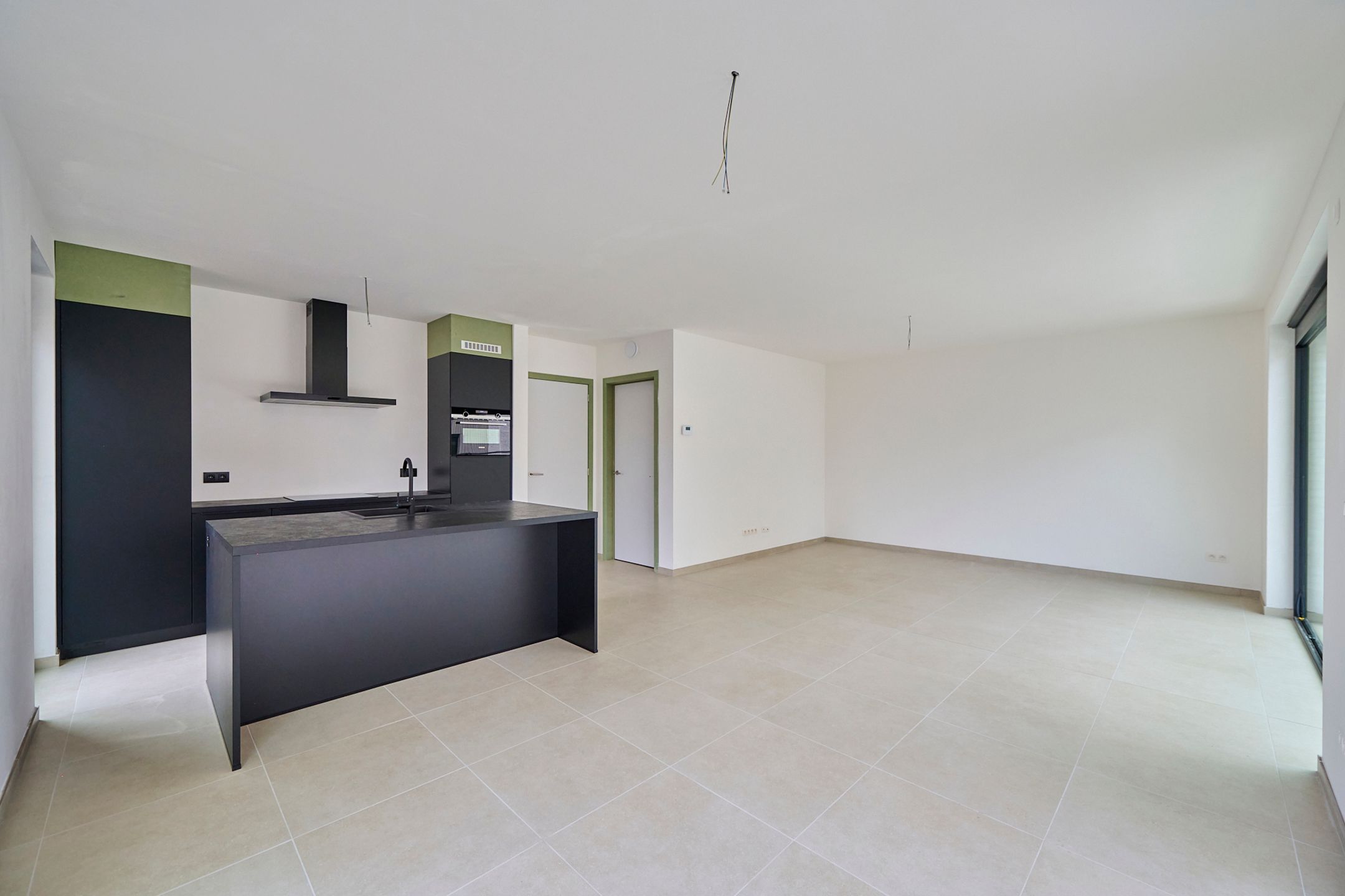 Gelijkvloers nieuwbouwappartement + privé tuintje foto 6