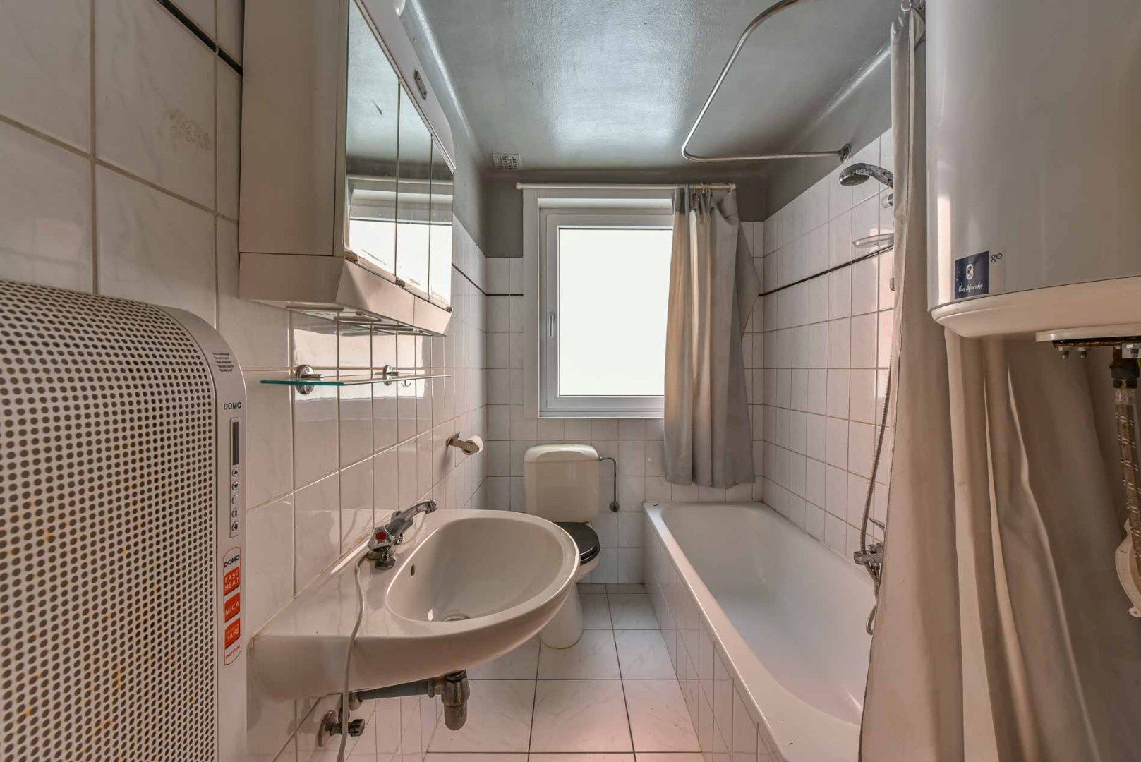 Op zoek naar een woning met veel potentieel, centraal gelegen in Merchtem? Welkom Home! foto 6