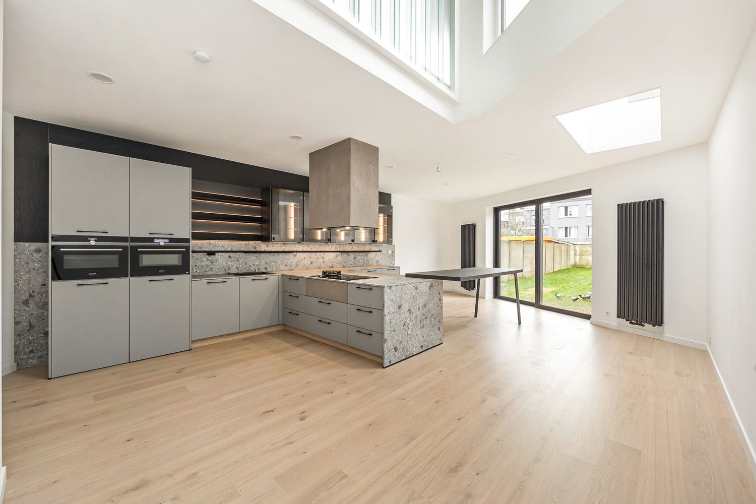 Riante volledig gerenoveerde 5-slk-woning met tuin (EPC A) foto 3
