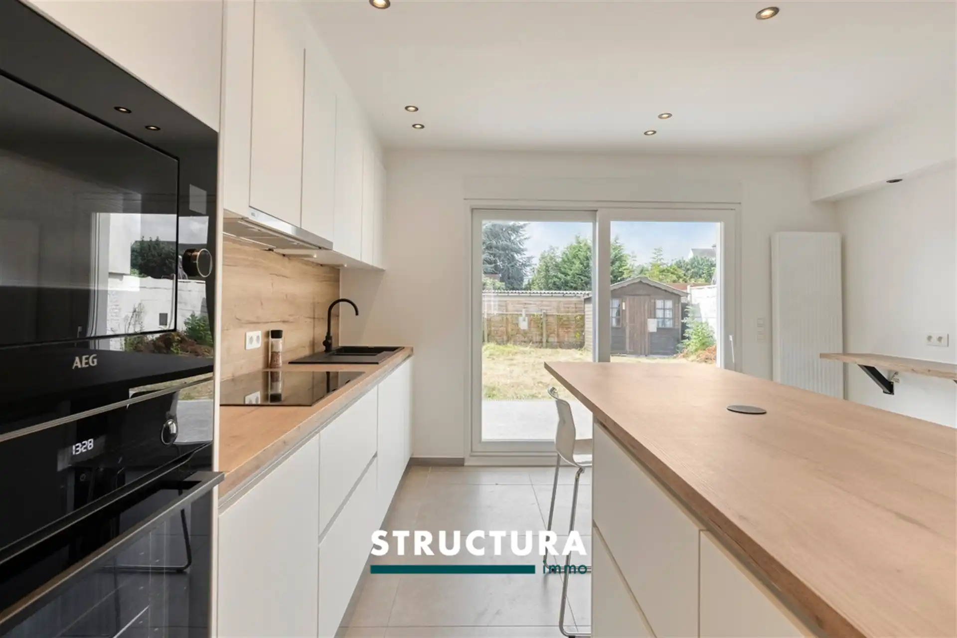 Instapklare gerenoveerde woning met zuidwestgerichte tuin foto 6