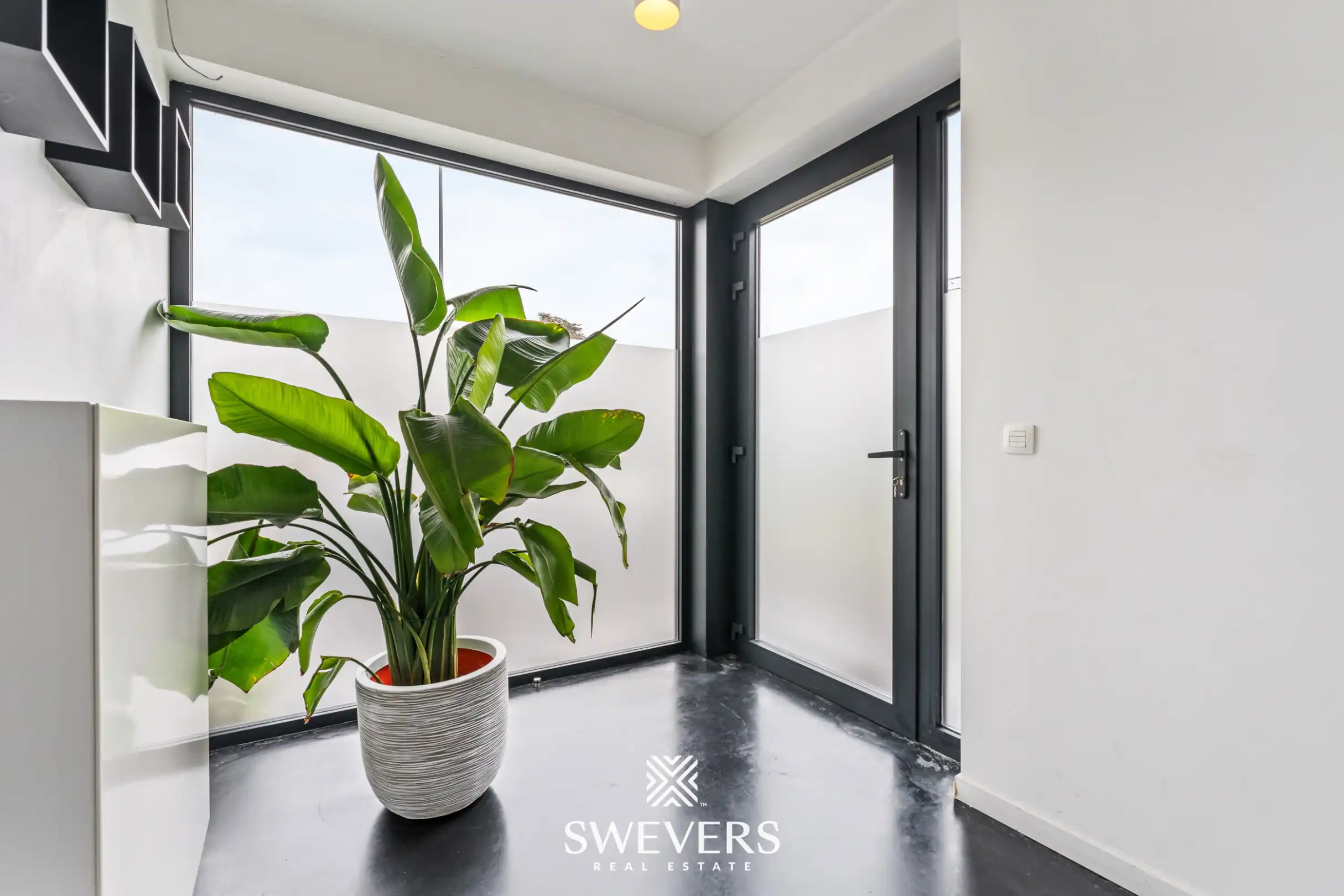 Recente en lichtrijke woning met zonnige zuidwestelijke tuin te Zonhoven:  foto 2