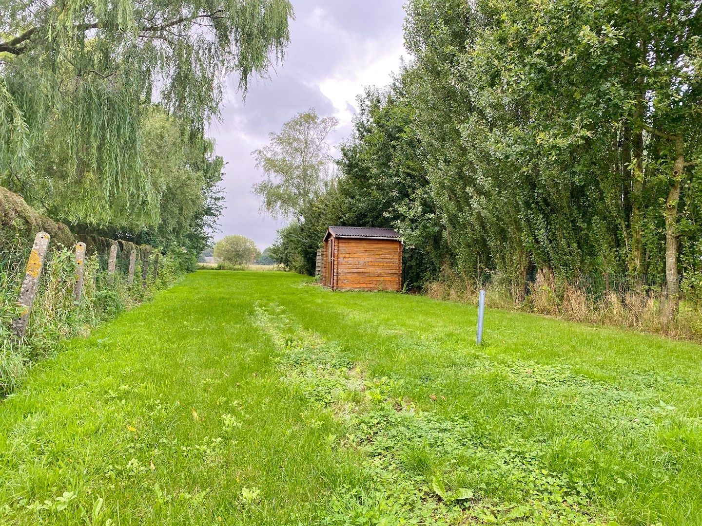 Volledig vernieuwde rijwoning met grote tuin, uitweg en parking. foto 15