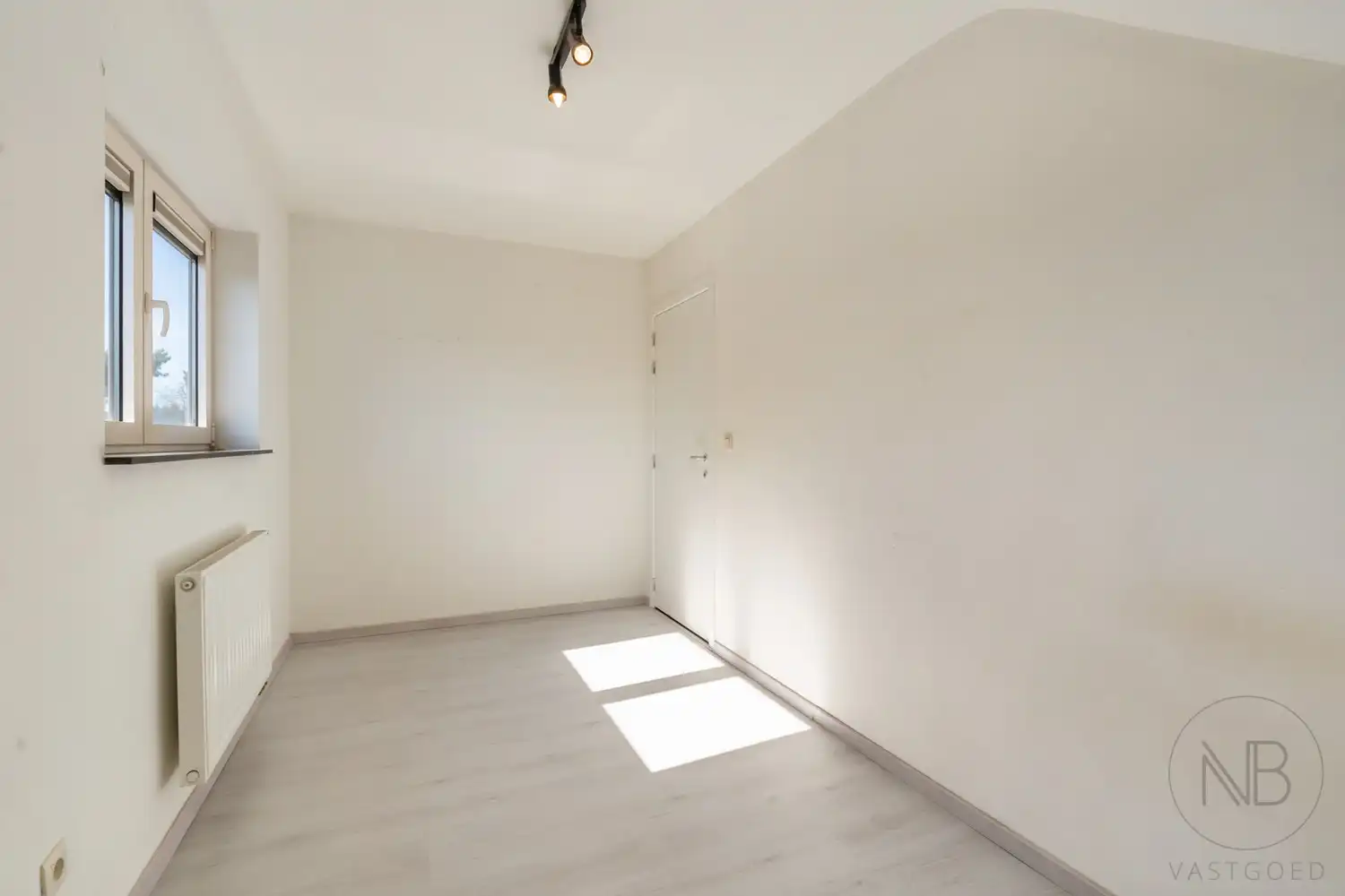 Ruim duplex appartement met 3 slaapkamers en groot terras in hartje Zutendaal foto 12