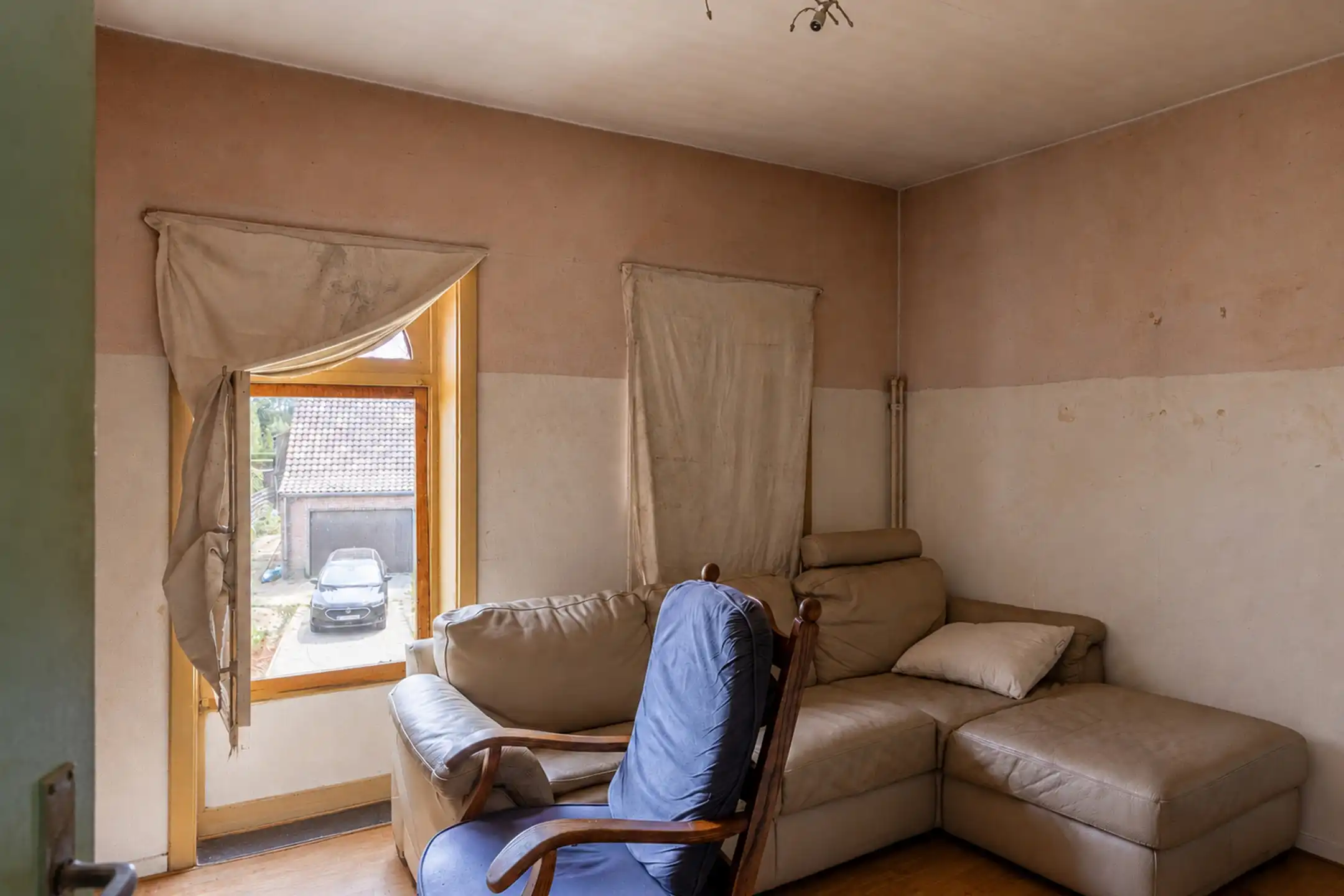 Te renoveren gesloten bebouwing met garage, ruime tuin en groenzicht in Oppuurs foto 16