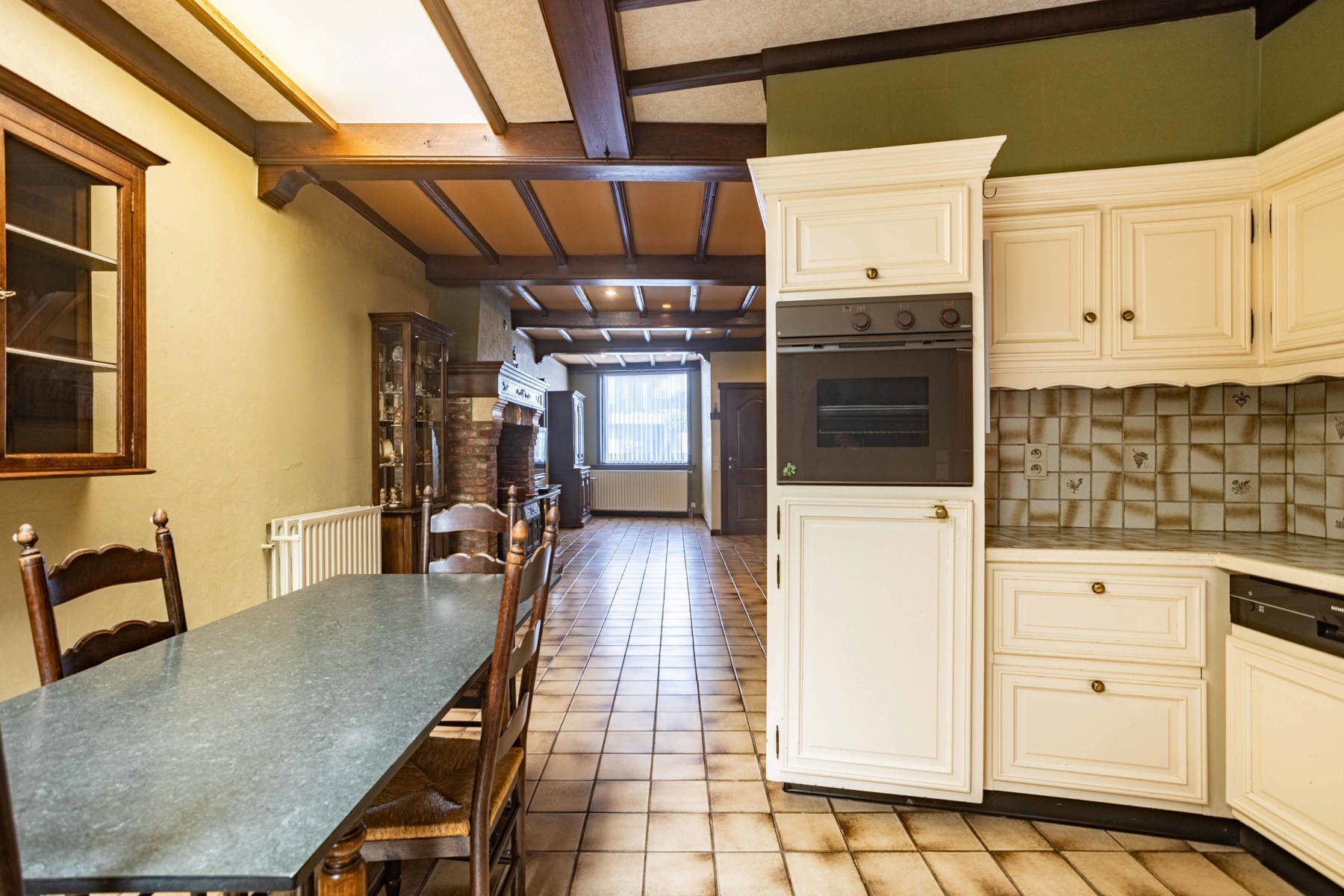 Te koop: deels te renoveren woning  aan de rand van Aalst foto 7