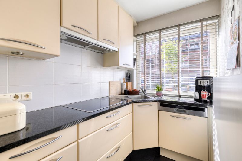 Verzorgd instapklaar twee slaapkamer gelijkvloersappartement met tuin en doorgang langs achteraan foto 10