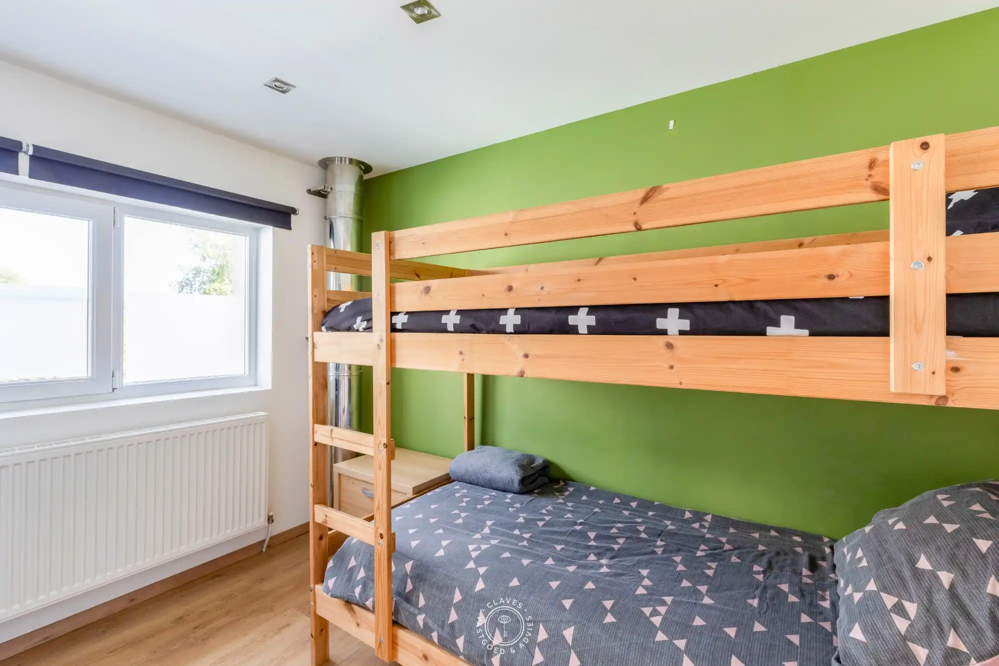 Moderne familiewoning met verrassende buitenruimte foto 14