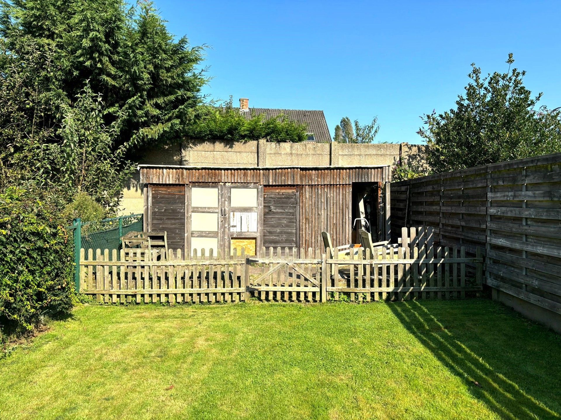 Gesloten bebouwing met ruime tuin en 3 slaapkamers foto 21