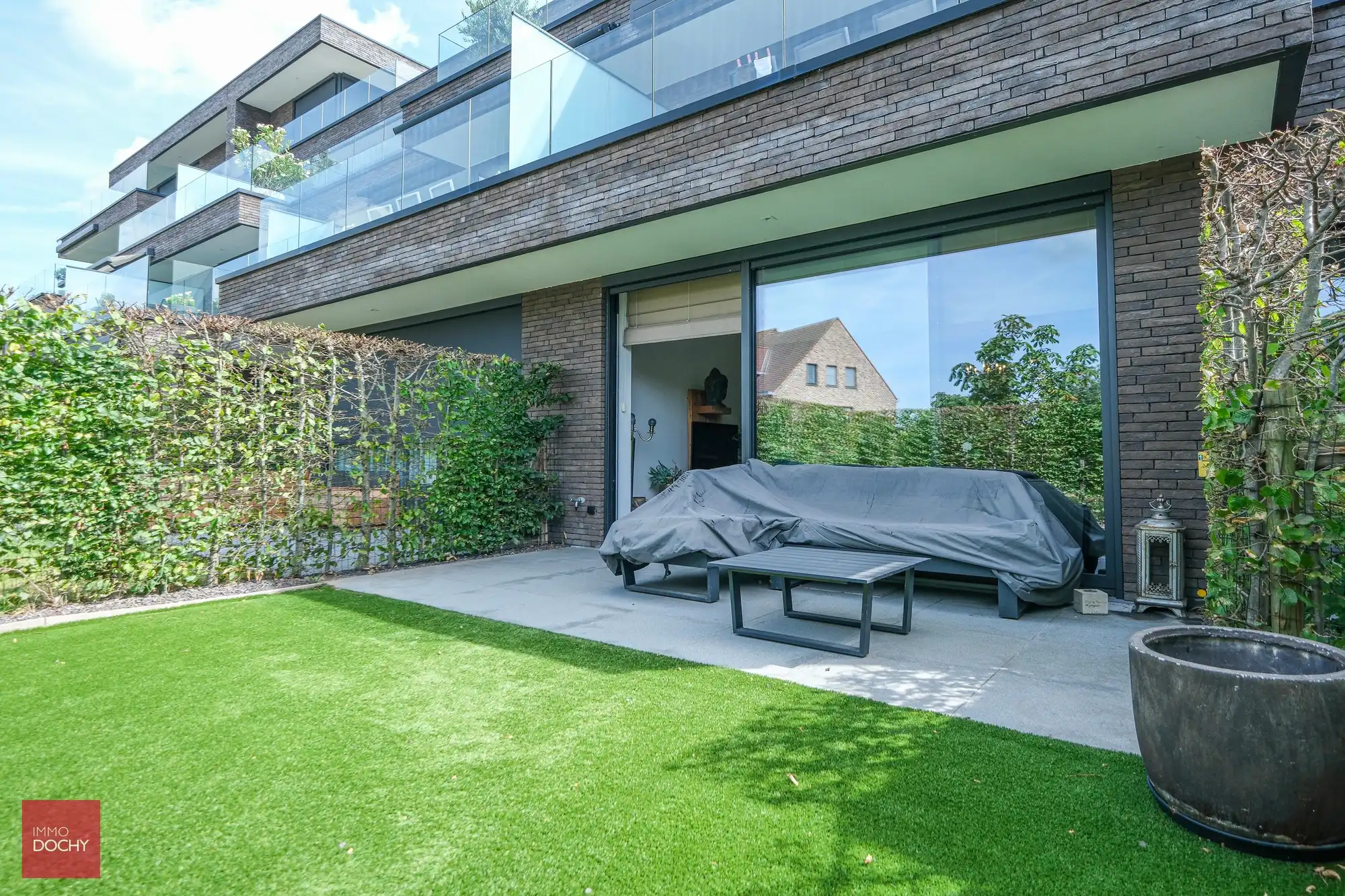 Gelijkvloers appartement met zongericht terras en tuin foto 16
