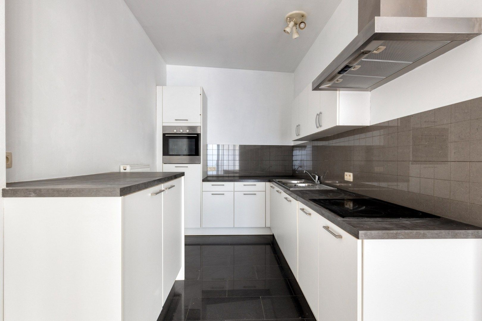 Gelijkvloers app. nabij centrum - instapklaar - 3slpks foto 7