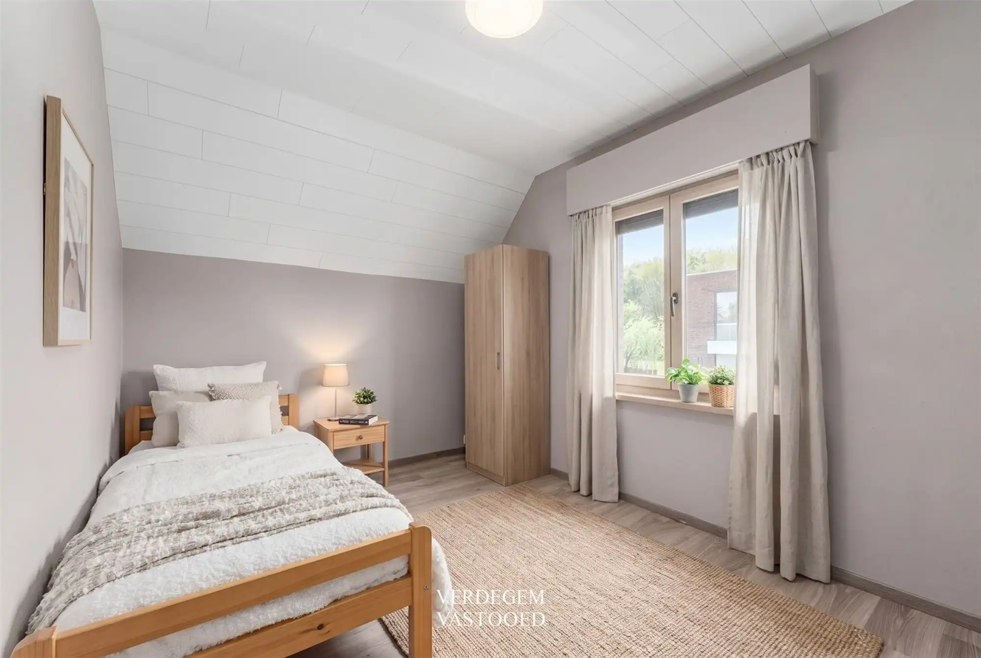 Charmante woning met 2 slaapkamers en fijne tuin met volledige privacy foto 12