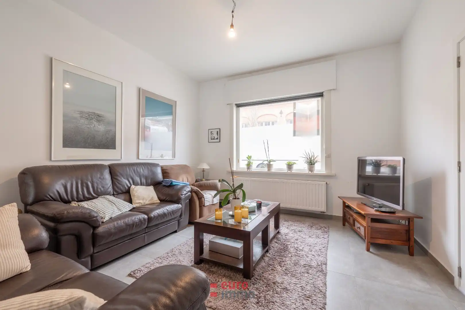 Lichtrijk gerenoveerd appartement in het hart van de stad! foto 3