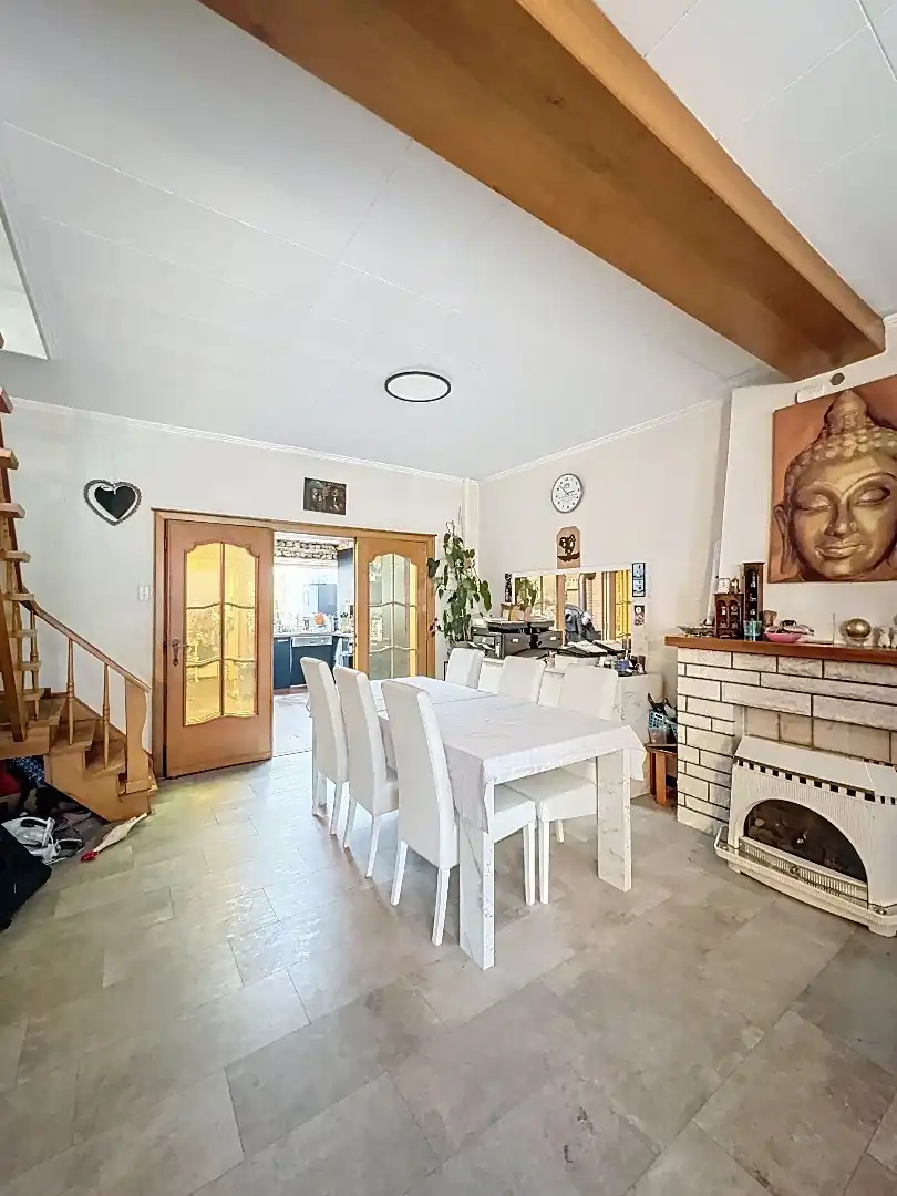 Gezellig wonen in Tienen: praktische rijwoning met terras en 3 slaapkamers foto 3