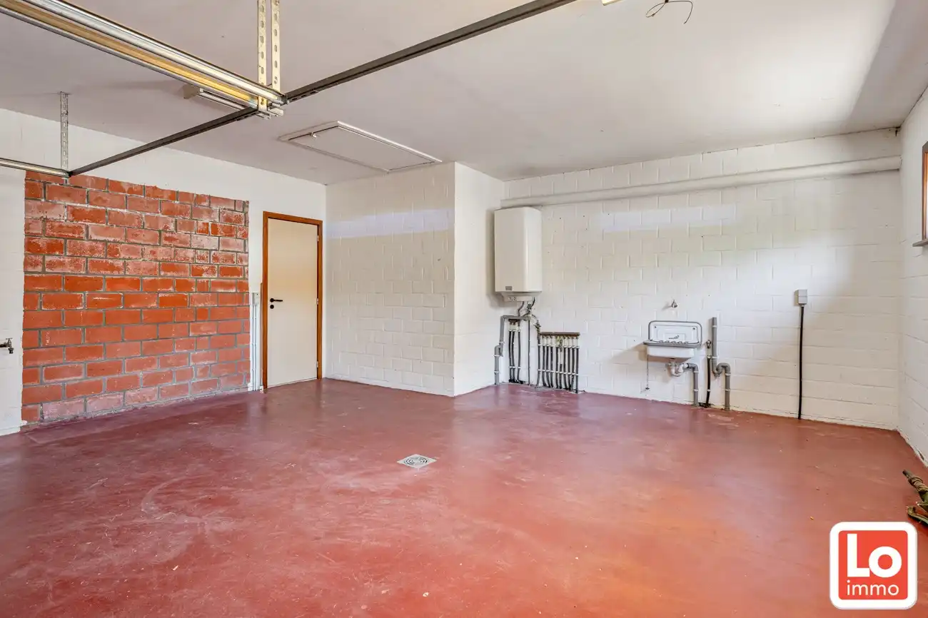Gelijkvloerse open woning met dubbele inpandige garage en zonnige tuin op een toplocatie nabij het centrum van Lochristi! foto 17