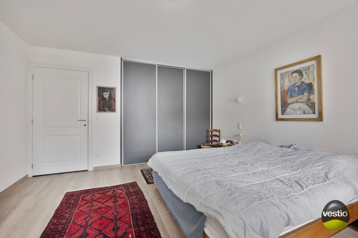 OPBRENGSTEIGENDOM VAN VERHUURD GELIJKVLOERS APPARTMENT MET 1 SLP NABIJ CENTRUM HOESELT. foto 10