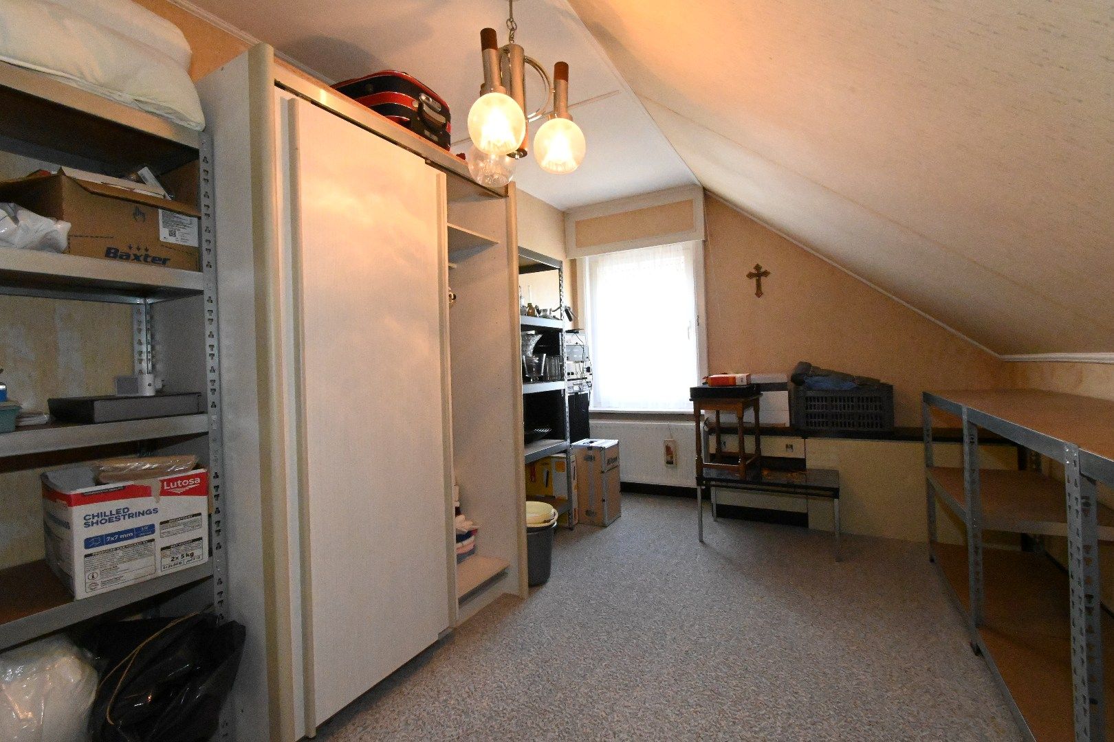 Alleenstaande woning met carport en tuin foto 24