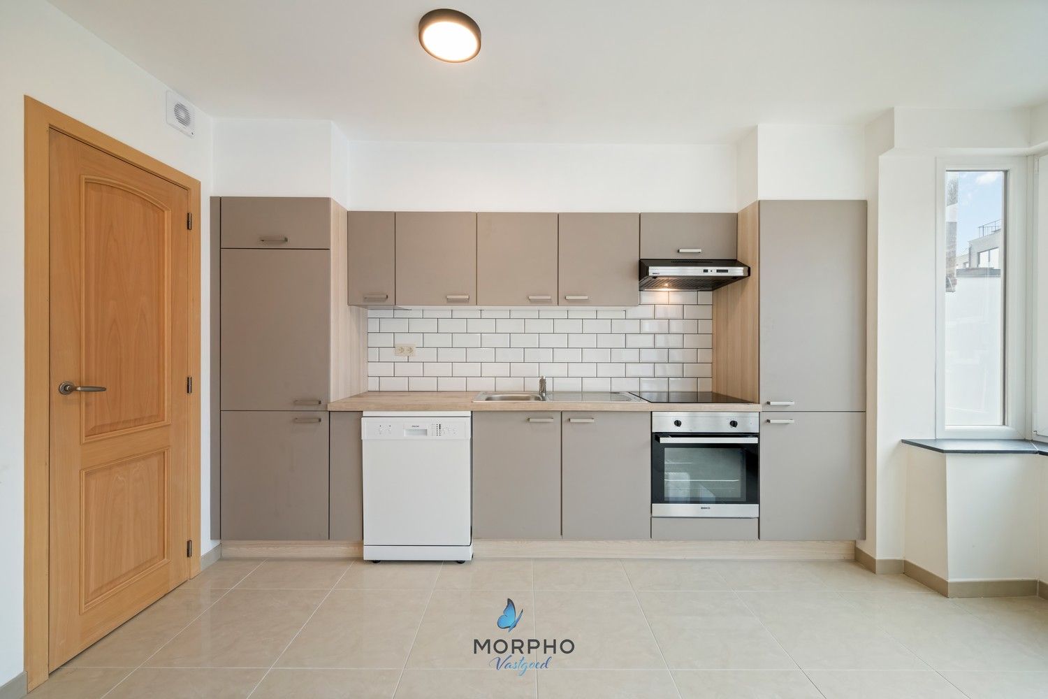 Modern en energiezuinig 2-slaapkamerappartement op de tweede verdieping in hartje Temse! foto 3