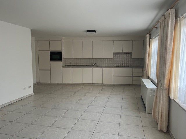 Ruim appartement met 2 slaapkamers en garage foto {{pictureIndex}}