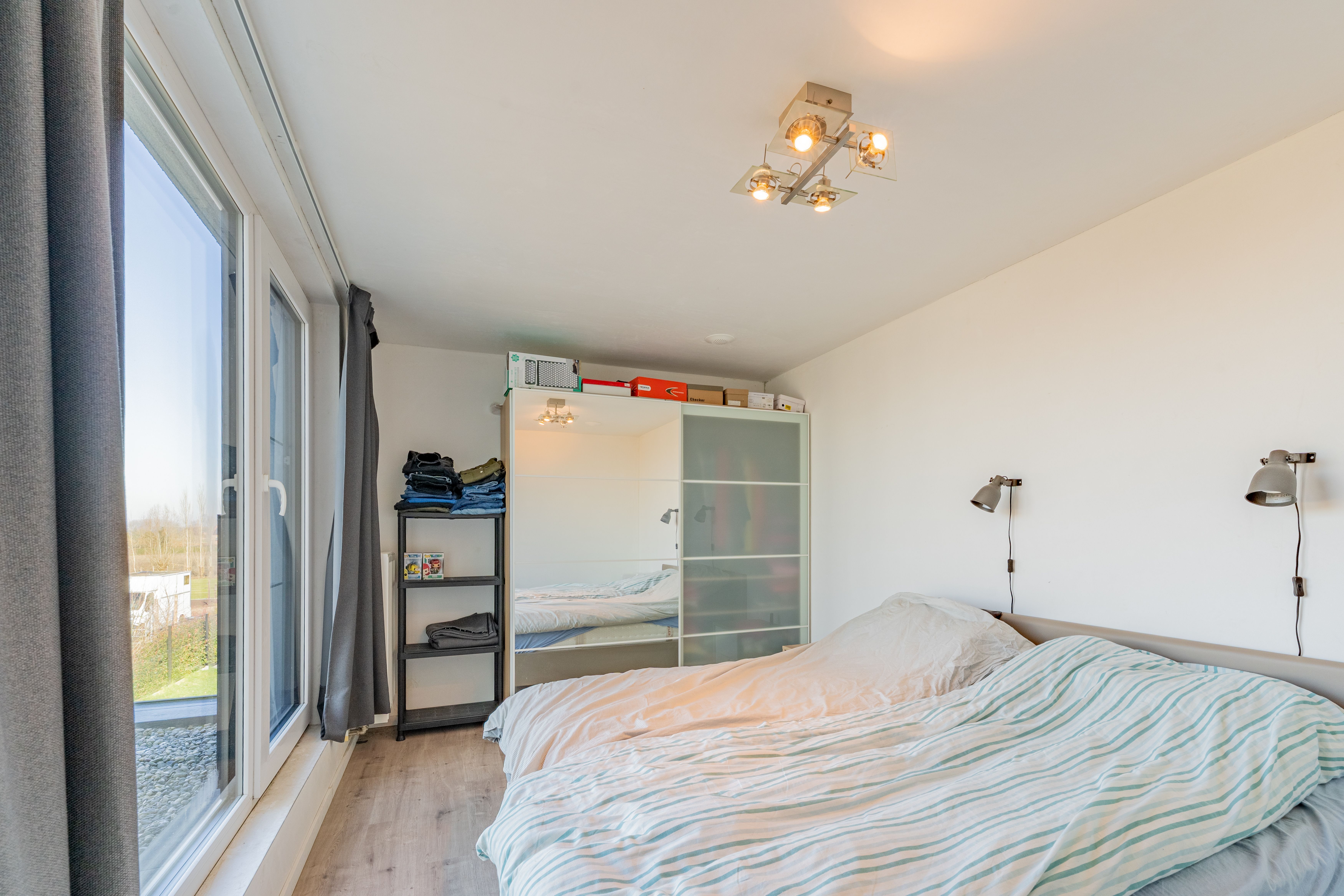 Halfopen bebouwing met inpandige garage en ruime tuin foto 8